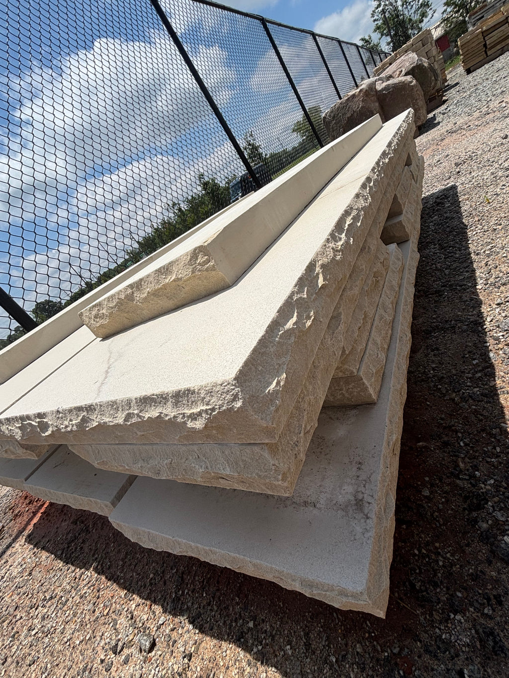 Natural sandstone hearth and mantle pieces stacked at 9 Oak in Jenkinsburg Georgia