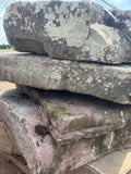 Natural fieldstone steppers stacked on a pallet at 9 Oak in Jenkinsburg Georgia