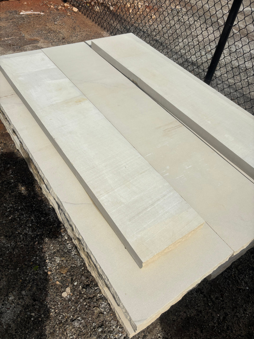 Natural sandstone hearth and mantle pieces stacked at 9 Oak in Jenkinsburg Georgia