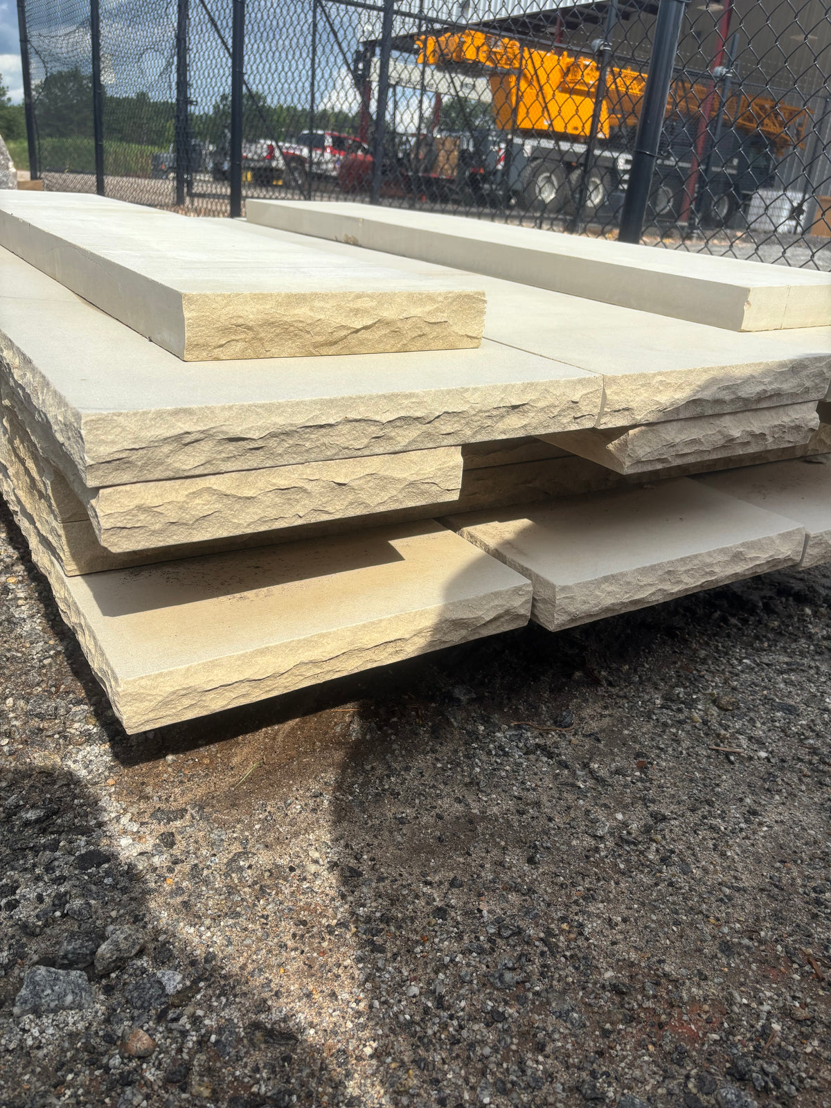 Natural sandstone hearth and mantle pieces stacked at 9 Oak in Jenkinsburg Georgia
