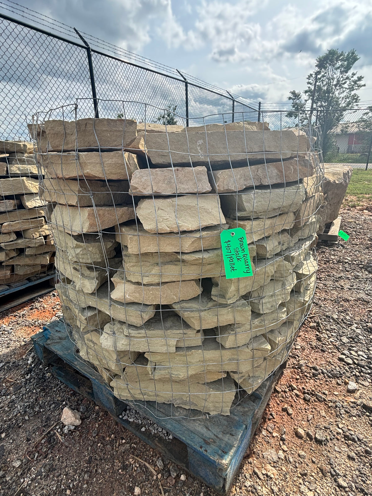 Brown quarry rock stacked on a pallet at 9 Oak in Jenkinsburg Georgia