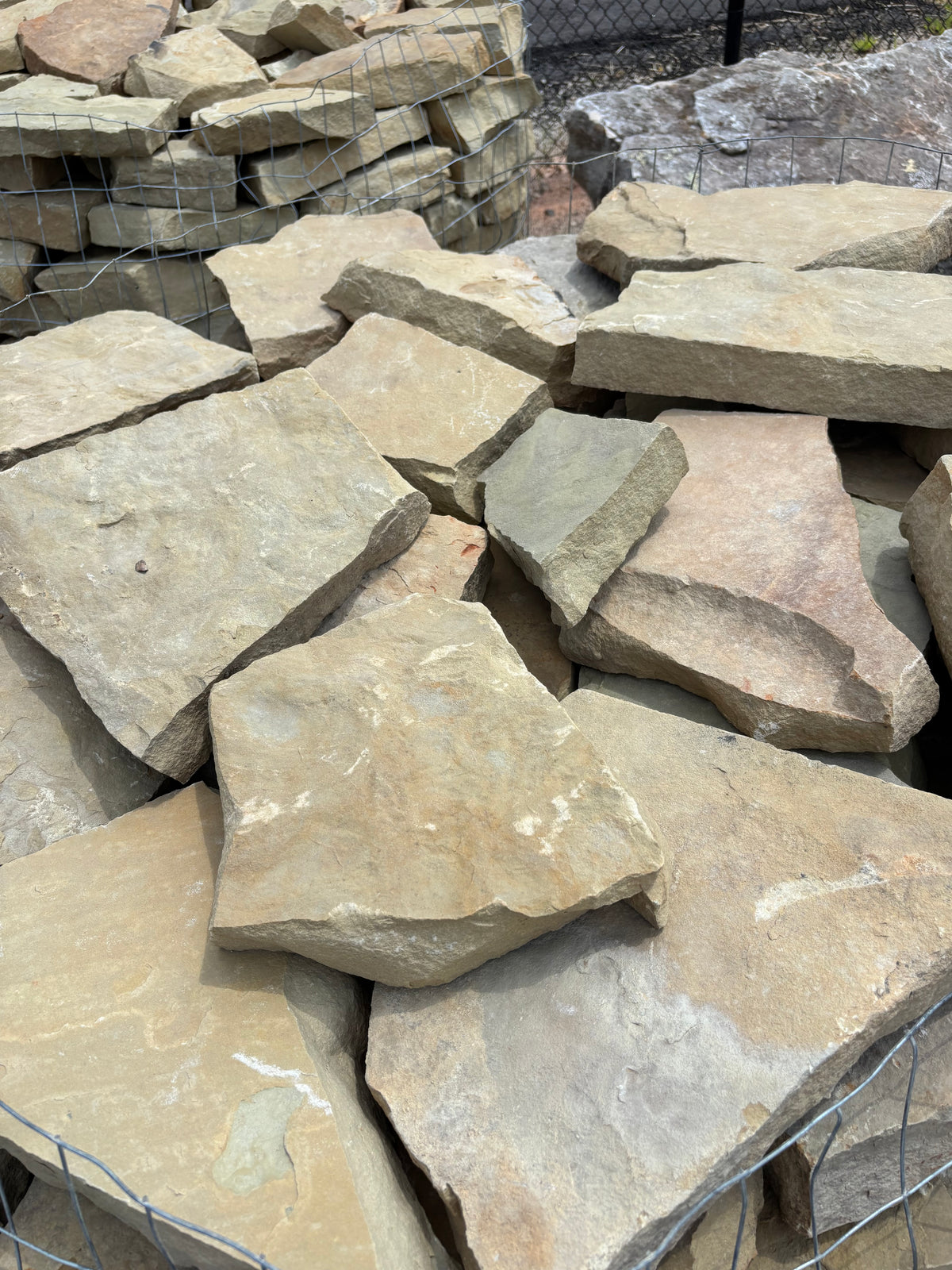 Brown quarry rock stacked on a pallet at 9 Oak in Jenkinsburg Georgia